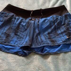 Nike Women's Black and Blue Athletic Shorts with built-in liner